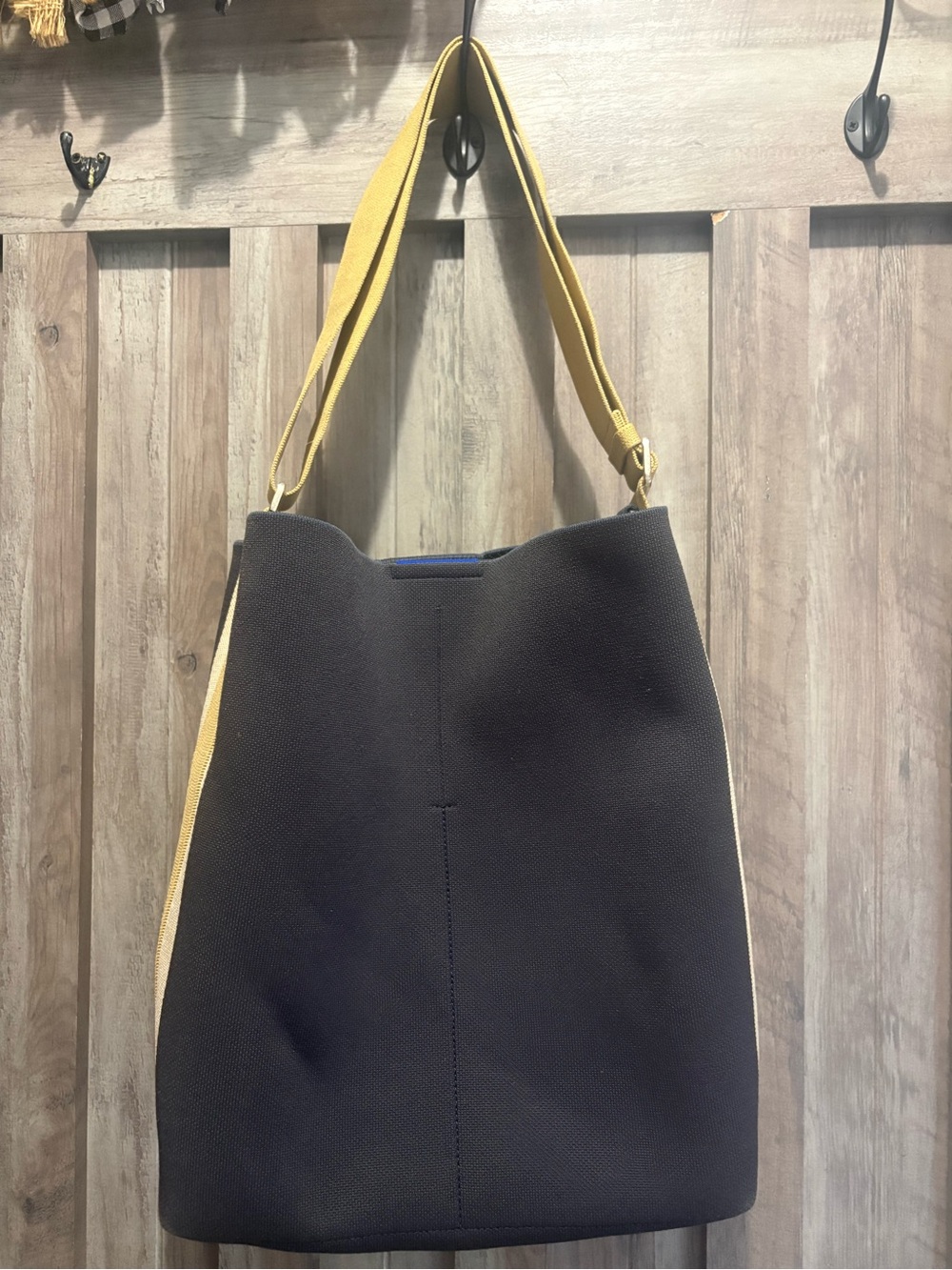 Rothy's Black Bucket with Yellow Strap